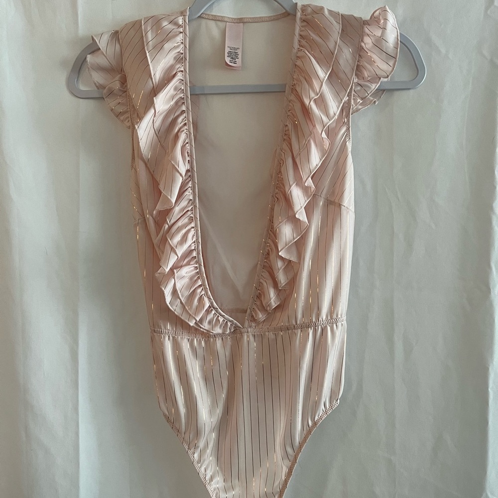 Victoria’s Secret Pink Ruffle Bodysuit with metallic accents